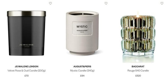 A trio of luxury designer candles sold at Harrods