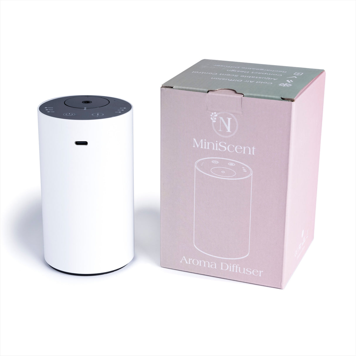 White aroma diffuser with its packaging on a white background