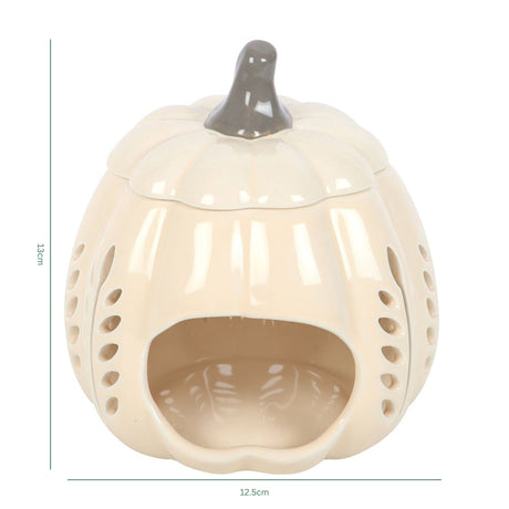 Beige ceramic pumpkin-shaped wax melter with dimensions on a white background