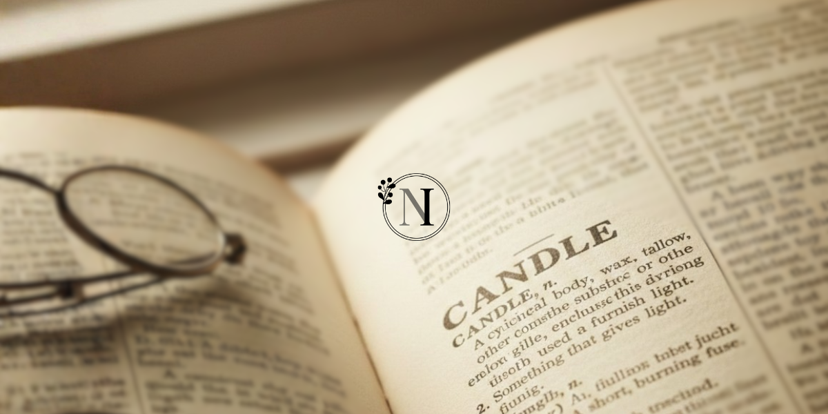 a dictionary open and showing the definition of 'candle'
