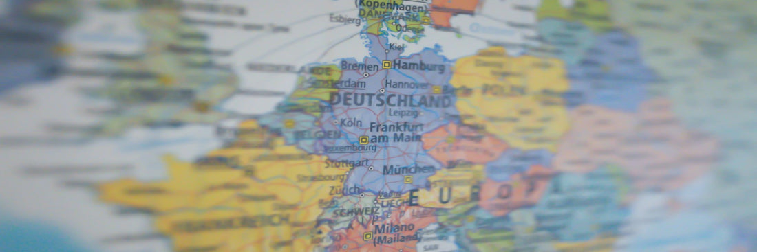 A zoomed-in shot of an atlas, focusing on European countries. Sourced from Pexels.
