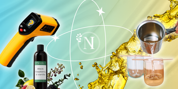 digital thermometer and candle wax being poured