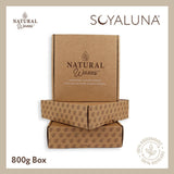 Soyaluna natural wax packaging with cardboard boxes on a beige background