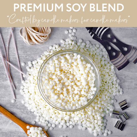Premium soy blend pearls in a glass bowl with candle-making tools on a gray surface.