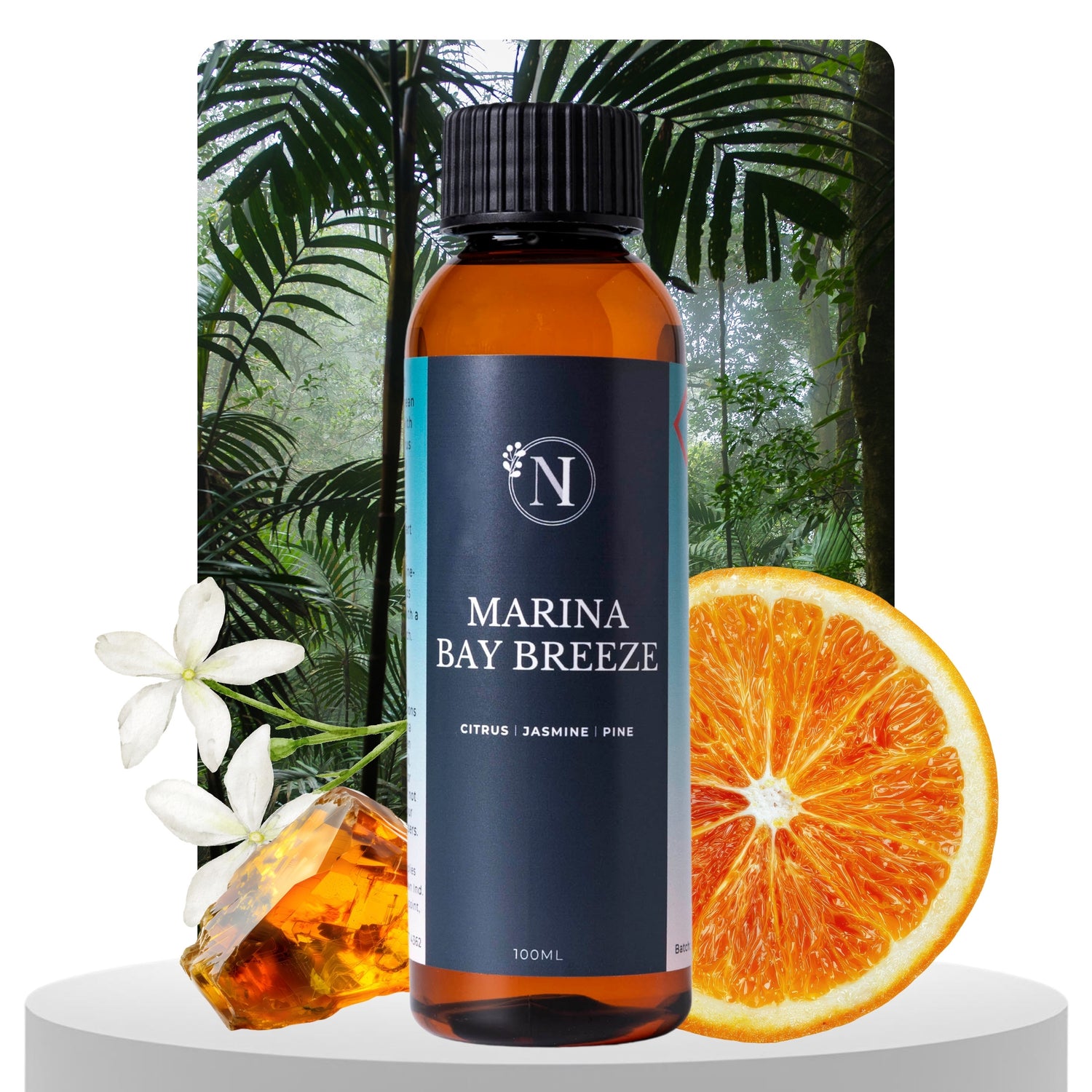 Bottle of 'Marina Bay Breeze' with tropical leaves and orange slice on a white background