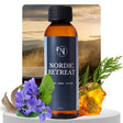 Bottle of 'Nordic Retreat' with natural elements and a scenic background